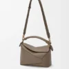 Kleine Puzzle Edge-Tasche aus weichem, genarbtem Kalbsleder Kleine Puzzle Edge-Tasche aus weichem, genarbtem Kalbsleder