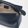 Kleine Puzzle Edge-Tasche aus weichem, genarbtem Kalbsleder Kleine Puzzle Edge-Tasche aus weichem, genarbtem Kalbsleder