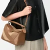 Kleine Puzzle-Tasche aus klassischem Kalbsleder und Wildleder Kleine Puzzle-Tasche aus klassischem Kalbsleder und Wildleder