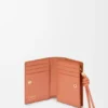 Kompaktes Portemonnaie mit Knot-Motiv aus glänzendem Nappa-Kalbsleder Kompaktes Portemonnaie mit Knot-Motiv aus glänzendem Nappa-Kalbsleder