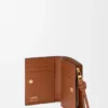Kompaktes Portemonnaie mit Knot-Motiv aus glänzendem Nappa-Kalbsleder Kompaktes Portemonnaie mit Knot-Motiv aus glänzendem Nappa-Kalbsleder