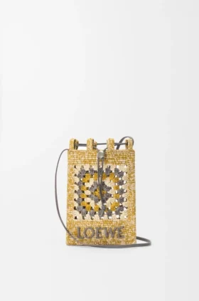 Kordelzugtasche aus klassischem Kalbsleder und Raffia