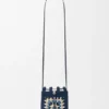 Kordelzugtasche aus klassischem Kalbsleder und Raffia Kordelzugtasche aus klassischem Kalbsleder und Raffia
