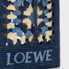 Kordelzugtasche aus klassischem Kalbsleder und Raffia Kordelzugtasche aus klassischem Kalbsleder und Raffia