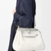 Madrid-Tasche in mittlerer Grösse aus geschmeidigem genarbtem Kalbsleder Madrid-Tasche in mittlerer Grösse aus geschmeidigem genarbtem Kalbsleder
