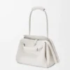 Madrid-Tasche in mittlerer Grösse aus geschmeidigem genarbtem Kalbsleder Madrid-Tasche in mittlerer Grösse aus geschmeidigem genarbtem Kalbsleder