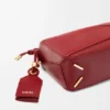 Mini Featherlight Puzzle-Tasche aus Nappa-Lammleder