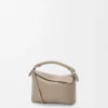 Mini Puzzle Edge-Tasche aus weichem, genarbtem Kalbsleder Mini Puzzle Edge-Tasche aus weichem, genarbtem Kalbsleder