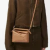 Mini Puzzle Edge-Tasche aus weichem, genarbtem Kalbsleder Mini Puzzle Edge-Tasche aus weichem, genarbtem Kalbsleder