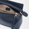 Mini Puzzle Edge-Tasche aus weichem, genarbtem Kalbsleder Mini Puzzle Edge-Tasche aus weichem, genarbtem Kalbsleder