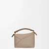 Mini Puzzle Edge-Tasche aus weichem, genarbtem Kalbsleder Mini Puzzle Edge-Tasche aus weichem, genarbtem Kalbsleder