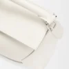 Mini Puzzle Edge-Tasche aus weichem, genarbtem Kalbsleder Mini Puzzle Edge-Tasche aus weichem, genarbtem Kalbsleder