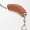 Mini-Squeeze-Tasche aus perlenverziertem Leder