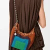 Mini-Squeeze-Tasche aus perlenverziertem Leder