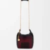 Mini-Squeeze-Tasche aus perlenverziertem Leder