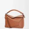 Mittlere «Puzzle Edge»-Tasche aus klassischem Kalbsleder Mittlere «Puzzle Edge»-Tasche aus klassischem Kalbsleder