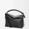 Mittlere «Puzzle Edge»-Tasche aus klassischem Kalbsleder Mittlere «Puzzle Edge»-Tasche aus klassischem Kalbsleder