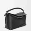 Mittlere «Puzzle Edge»-Tasche aus klassischem Kalbsleder Mittlere «Puzzle Edge»-Tasche aus klassischem Kalbsleder