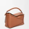 Mittlere «Puzzle Edge»-Tasche aus klassischem Kalbsleder Mittlere «Puzzle Edge»-Tasche aus klassischem Kalbsleder
