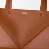 Mittlere Puzzle Fold Tote Bag aus glänzendem Kalbsleder Mittlere Puzzle Fold Tote Bag aus glänzendem Kalbsleder