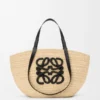 Mittlerer «Eclipse»-Korb aus Raffia und Kalbsleder Mittlerer «Eclipse»-Korb aus Raffia und Kalbsleder