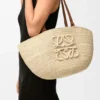 Mittlerer «Eclipse»-Korb aus Raffia und Kalbsleder Mittlerer «Eclipse»-Korb aus Raffia und Kalbsleder