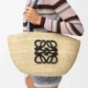 Mittlerer «Eclipse»-Korb aus Raffia und Kalbsleder Mittlerer «Eclipse»-Korb aus Raffia und Kalbsleder
