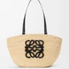 Mittlerer «Eclipse»-Korb aus Raffia und Kalbsleder Mittlerer «Eclipse»-Korb aus Raffia und Kalbsleder
