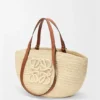 Mittlerer «Eclipse»-Korb aus Raffia und Kalbsleder Mittlerer «Eclipse»-Korb aus Raffia und Kalbsleder