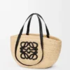 Mittlerer «Eclipse»-Korb aus Raffia und Kalbsleder Mittlerer «Eclipse»-Korb aus Raffia und Kalbsleder