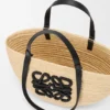 Mittlerer «Eclipse»-Korb aus Raffia und Kalbsleder Mittlerer «Eclipse»-Korb aus Raffia und Kalbsleder