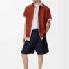 Plissierte Shorts aus Baumwolle und Leinen Plissierte Shorts aus Baumwolle und Leinen