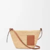 Pochette-Tasche «Slit» aus Raffia und Kalbsleder