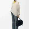 Polo-Pullover aus einer Kaschmir-Seiden-Mischung Polo-Pullover aus einer Kaschmir-Seiden-Mischung