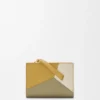 Puzzle Compact-Portemonnaie aus klassischem Kalbsleder Puzzle Compact-Portemonnaie aus klassischem Kalbsleder