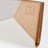 Puzzle Compact-Portemonnaie aus klassischem Kalbsleder Puzzle Compact-Portemonnaie aus klassischem Kalbsleder