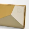 Puzzle Compact-Portemonnaie aus klassischem Kalbsleder Puzzle Compact-Portemonnaie aus klassischem Kalbsleder