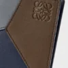 Puzzle-Kartenetui mit zwei Fächern aus klassischem Kalbsleder Puzzle-Kartenetui mit zwei Fächern aus klassischem Kalbsleder