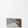 Puzzle-Münz-Visitenkartenetui aus klassischem Kalbsleder Puzzle-Münz-Visitenkartenetui aus klassischem Kalbsleder
