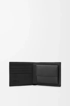 Puzzle-Portemonnaie mit zwei Fächern aus geschmeidigem, genarbtem Kalbsleder Puzzle-Portemonnaie mit zwei Fächern aus geschmeidigem, genarbtem Kalbsleder