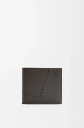 Puzzle-Portemonnaie zum Zusammenklappen aus klassischem Kalbsleder Puzzle-Portemonnaie zum Zusammenklappen aus klassischem Kalbsleder
