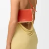 Rio-Pouch aus klassischem Kalbsleder und Raffia Rio-Pouch aus klassischem Kalbsleder und Raffia