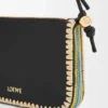 Rio-Pouch aus klassischem Kalbsleder und Raffia Rio-Pouch aus klassischem Kalbsleder und Raffia