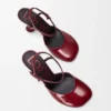 Toy Pumps mit Fersenriemen aus weichem Lammleder in Lackoptik Toy Pumps mit Fersenriemen aus weichem Lammleder in Lackoptik