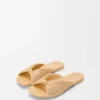 Weiche Pantolette mit «Pebble»-Design aus Stoff in Raffia-Optik Weiche Pantolette mit «Pebble»-Design aus Stoff in Raffia-Optik