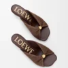 Weiche Pantolette mit «Pebble»-Design aus Stoff in Raffia-Optik